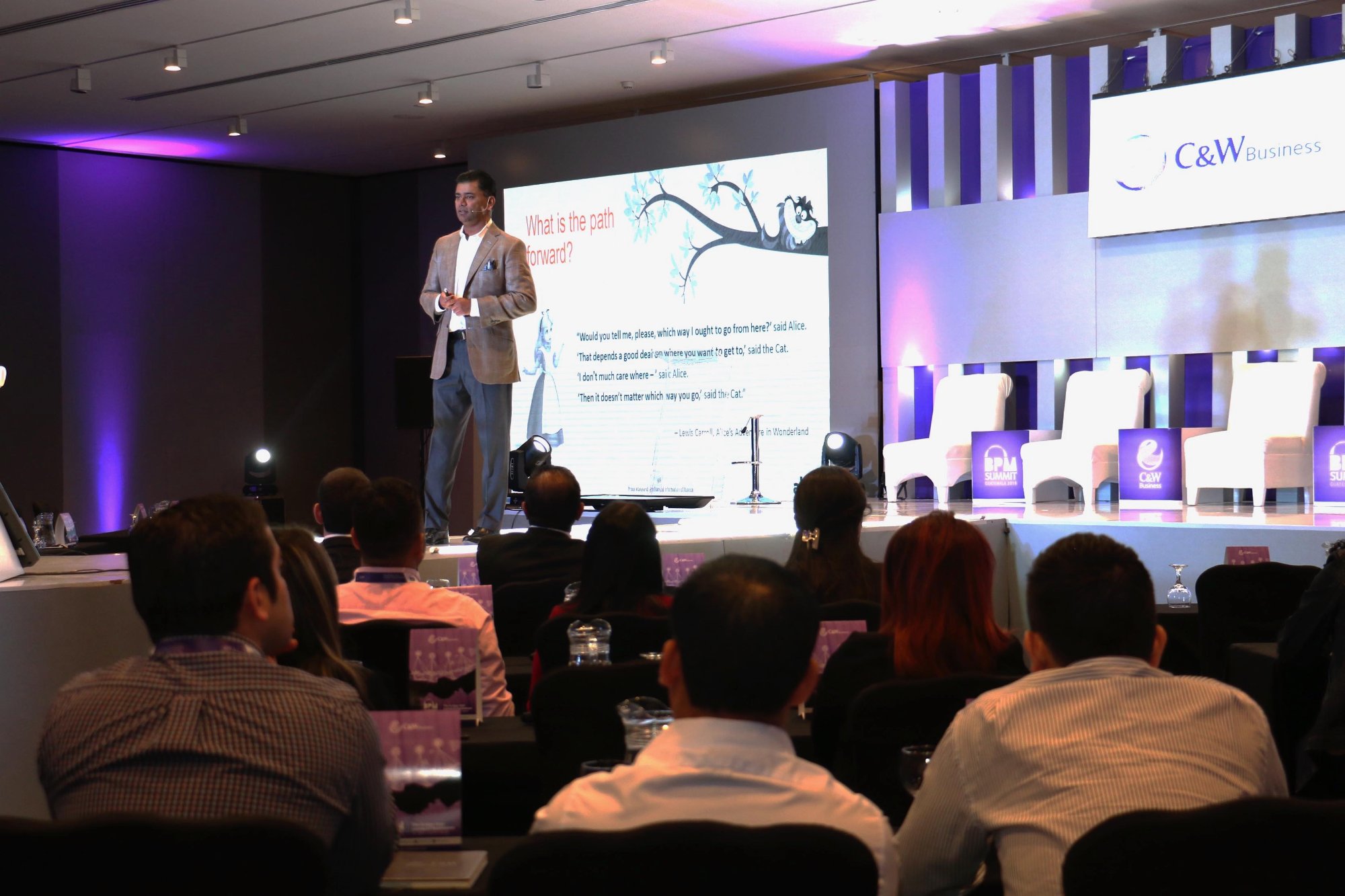 Ashish Bisaria speaking on stage